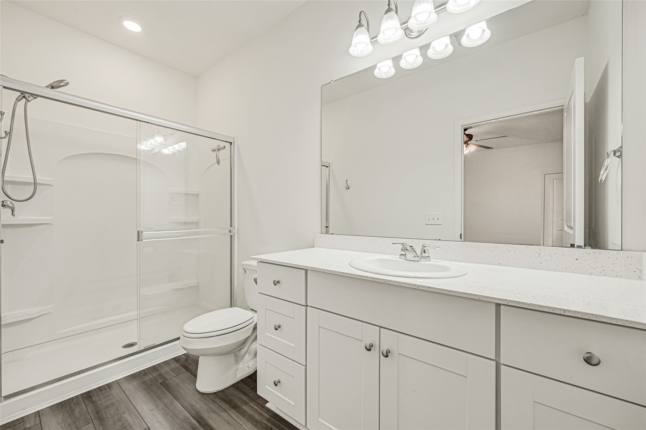 7311 Roseshine Drive Houston, TX 77049 - Photo 16 of 26 Well-appointed bathroom featuring a modern vanity and contemporary fixtures.