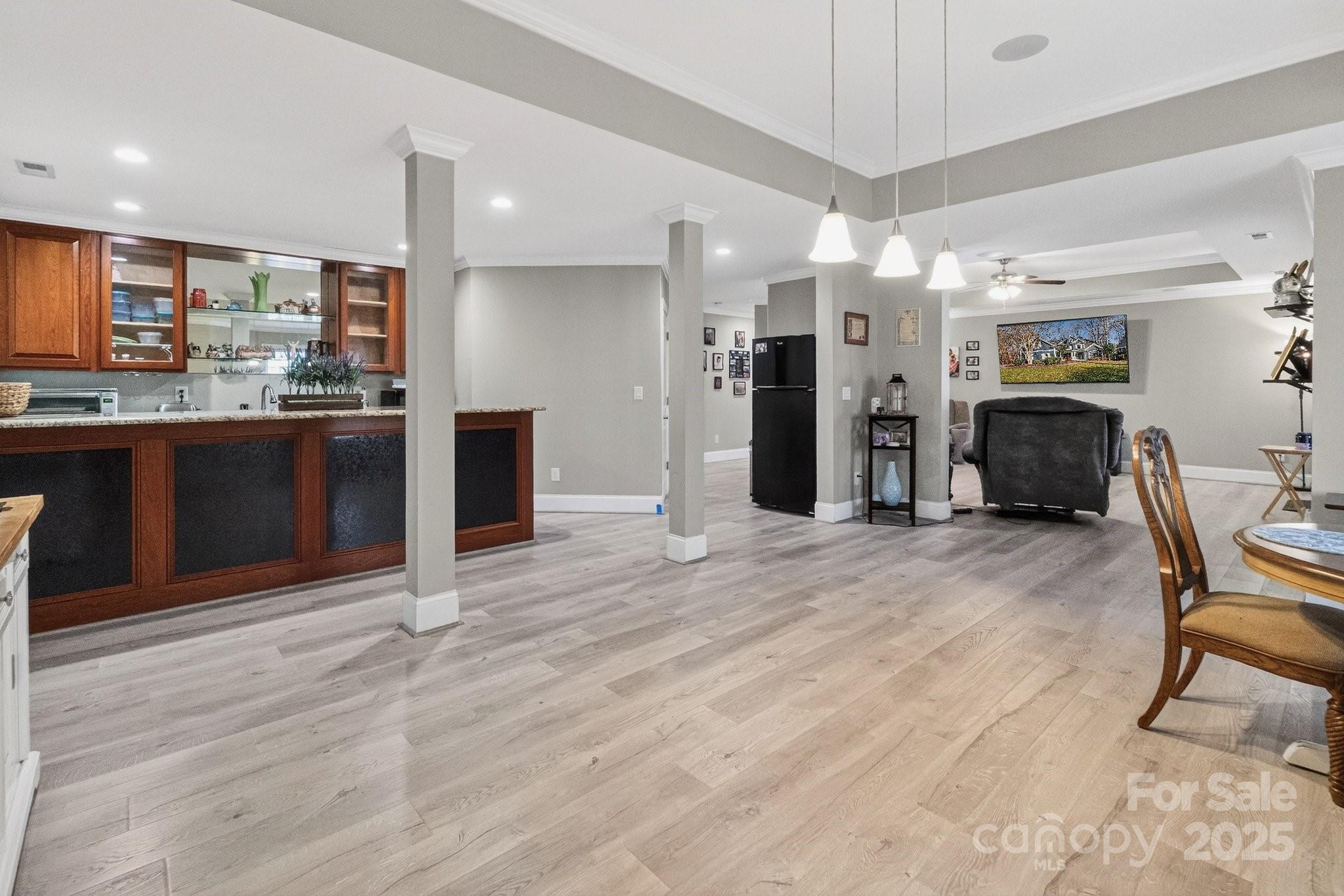 7653 Juniper Lane Denver, NC 28037 - Photo 35 of 43 a open kitchen with stainless steel appliances granite countertop a refrigerator and a stove top oven