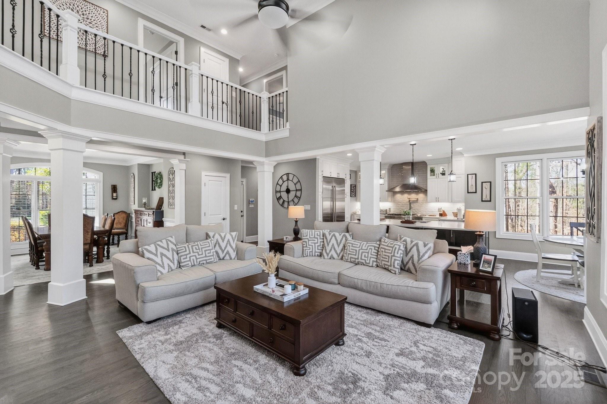 7653 Juniper Lane Denver, NC 28037 - Photo 8 of 43 a living room with furniture or couch and a wooden floor