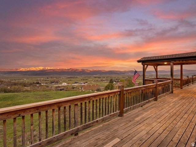 290 Splendor Valley Road Kamas, UT 84036 - Photo 1 of 1 Expansive outdoor deck with wood-finish flooring and railing