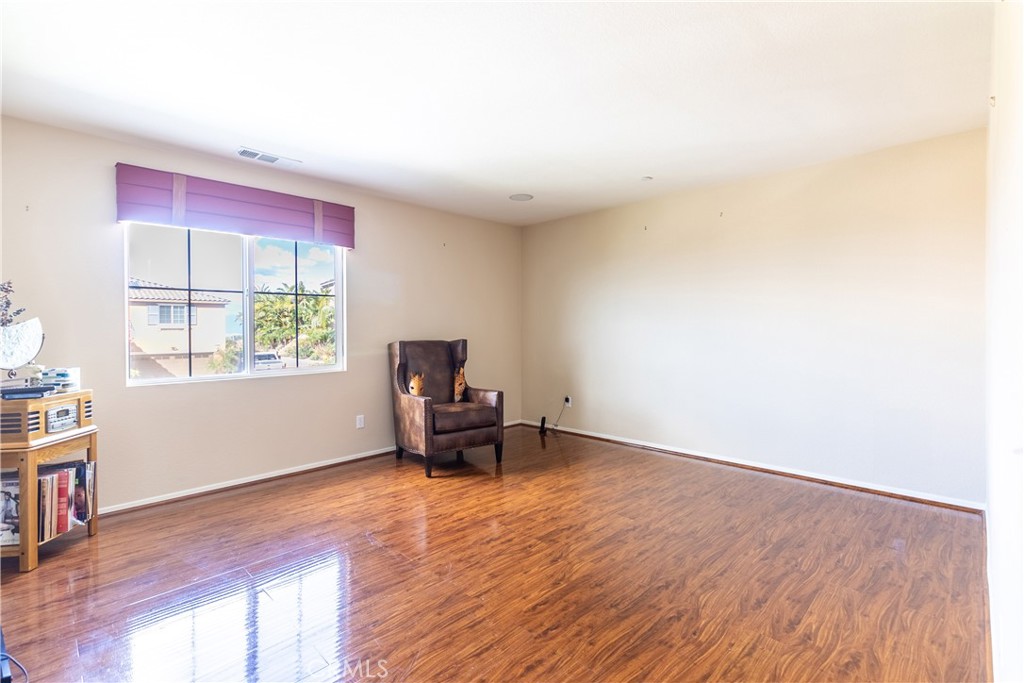 16657 Golden Bluff Loop Riverside, CA 92503 - Photo 23 of 47 a view of livingroom with hardwood