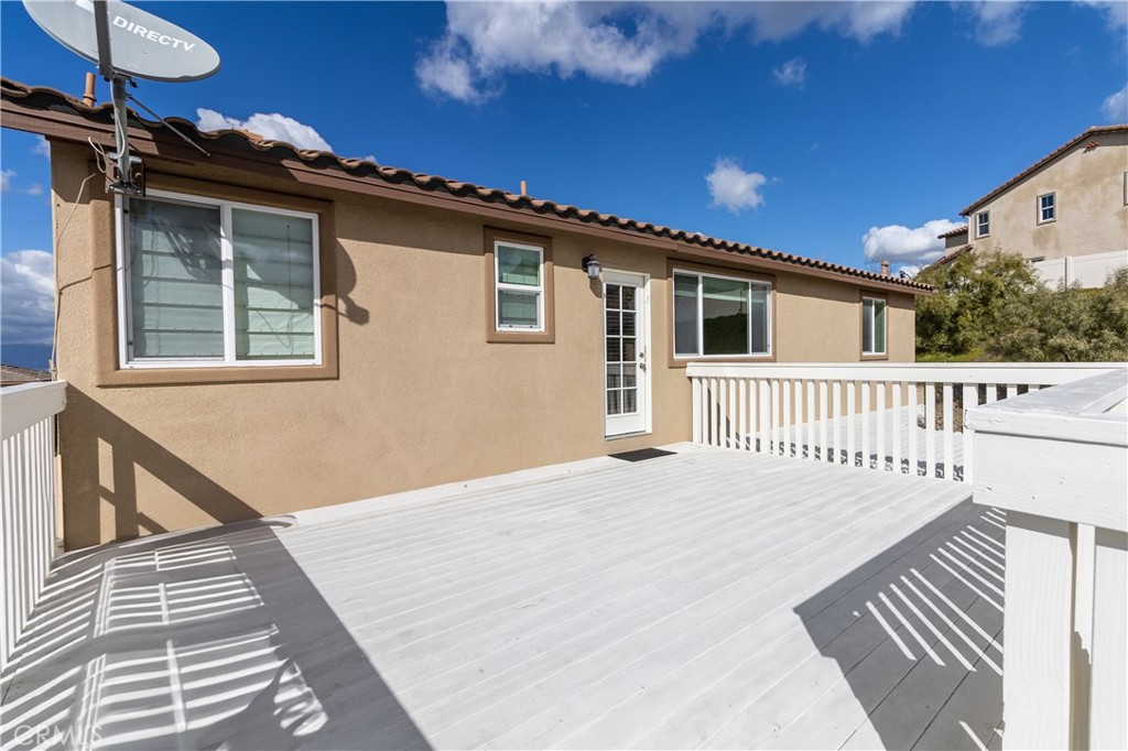 16657 Golden Bluff Loop Riverside, CA 92503 - Photo 35 of 47 a view of a house with a deck