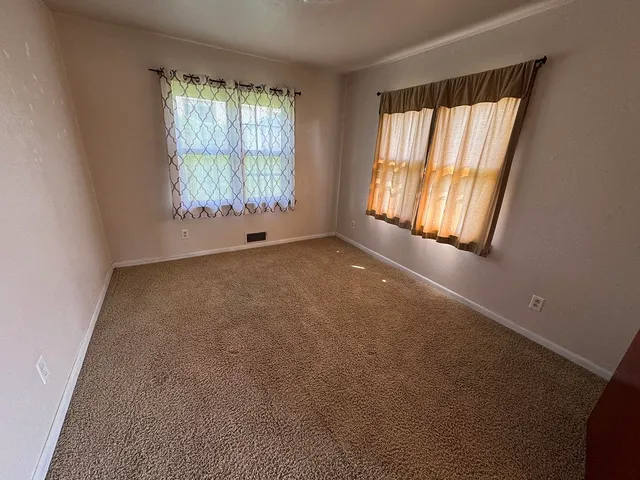 a view of empty room with window