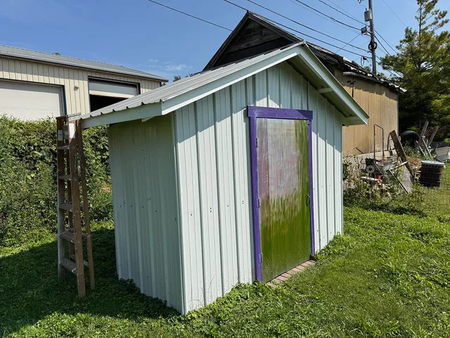 a yellow house with outdoor space