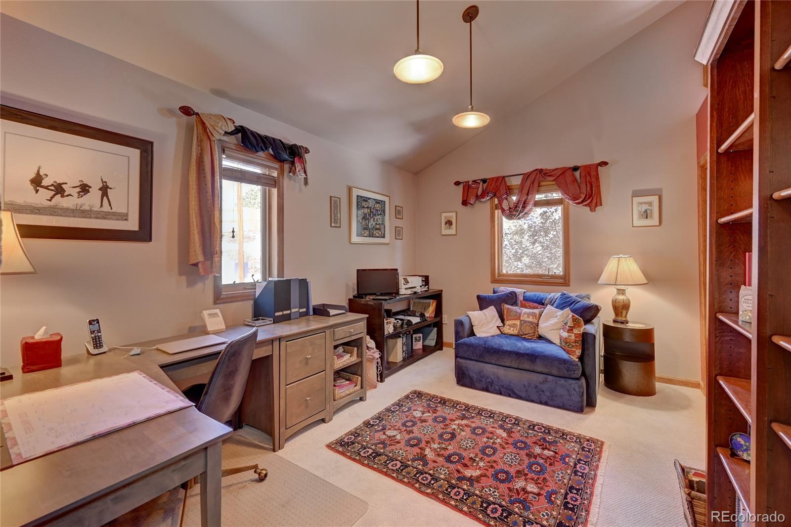 27 Conifer Road Golden, CO 80401 - Photo 20 of 40 a view of a workspace with furniture and window