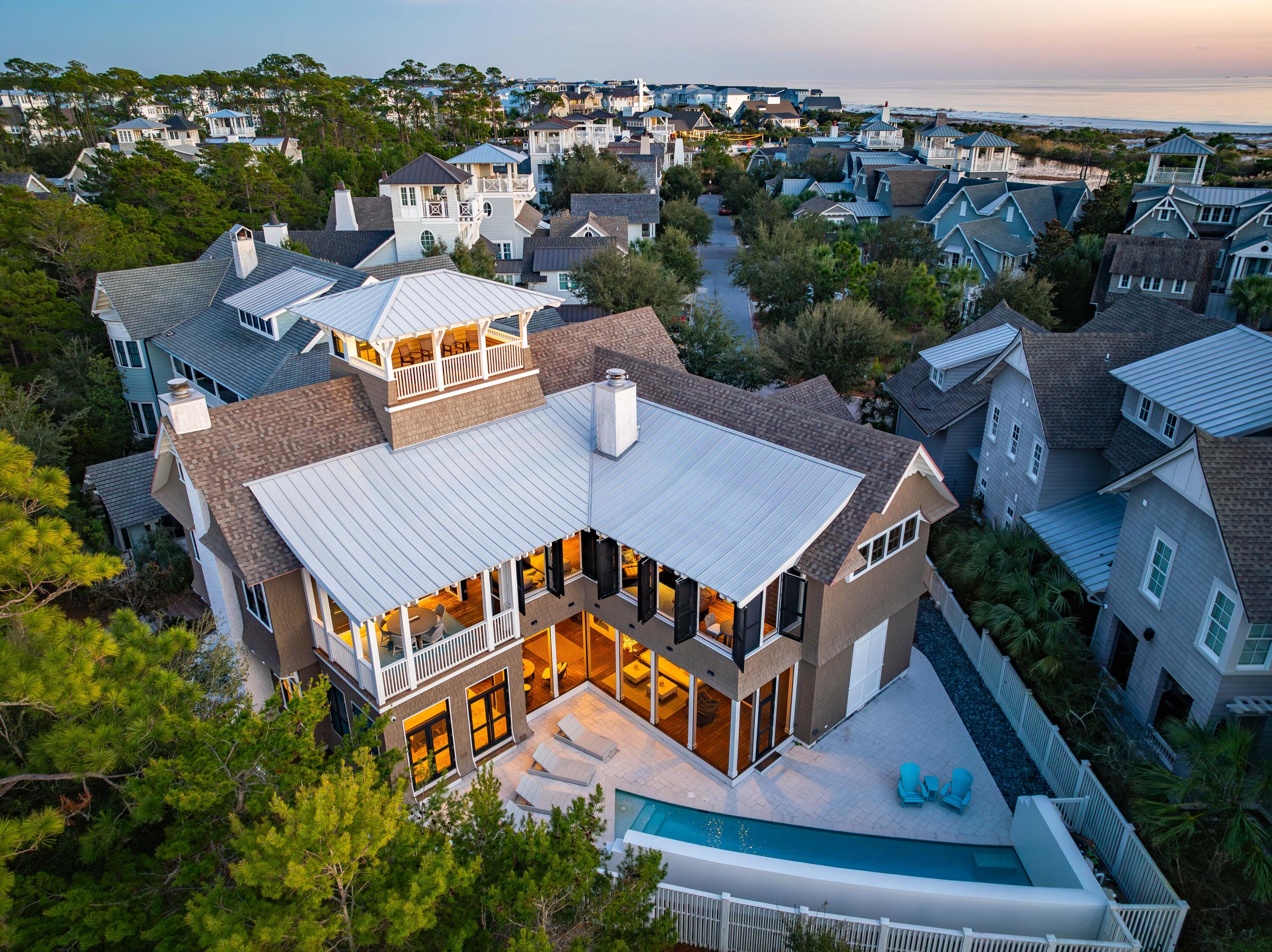 47 Compass Point Way Inlet Beach, FL 32461 - Photo 1 of 50 an aerial view of a house with balcony and outdoor space