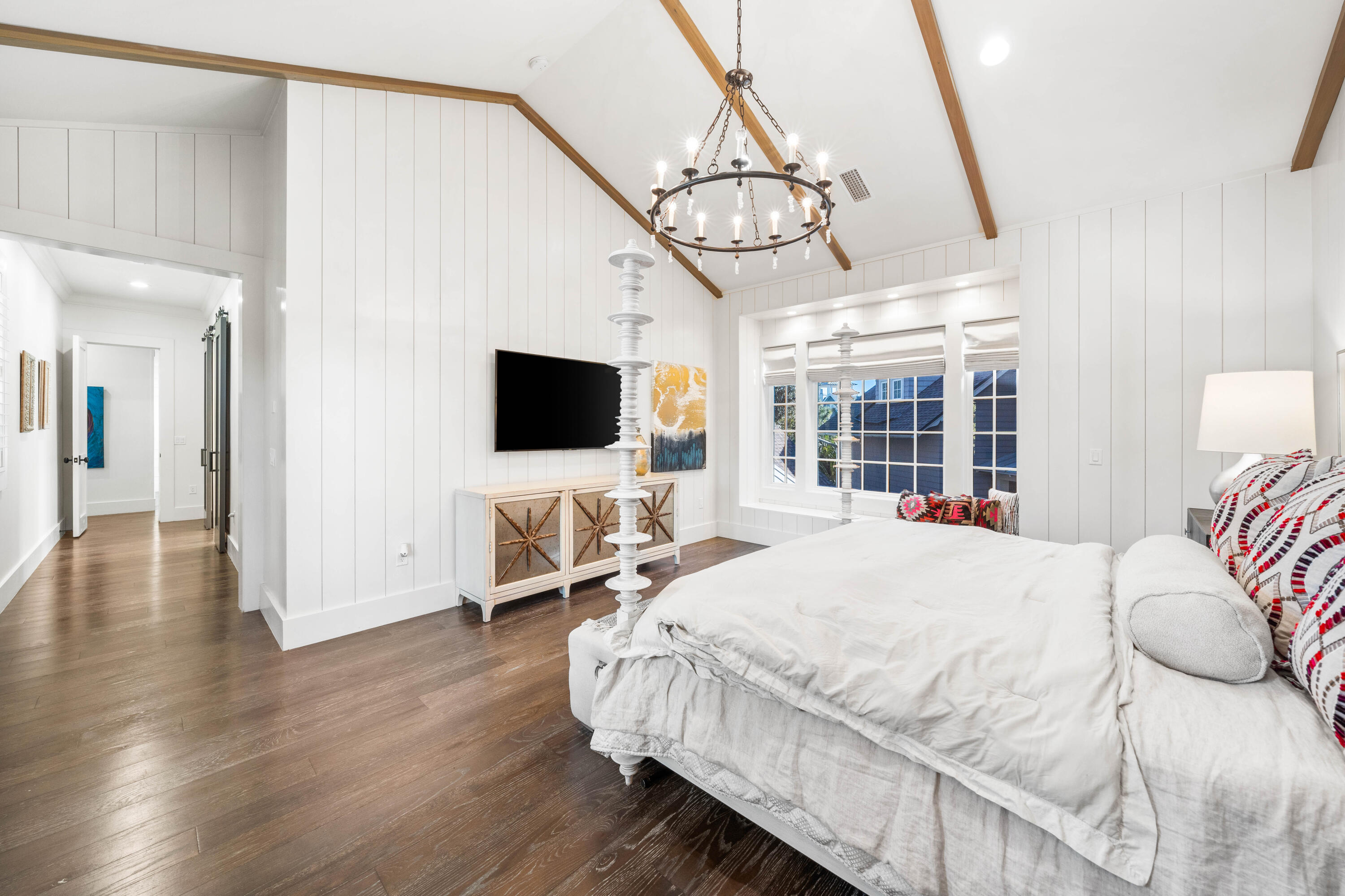 47 Compass Point Way Inlet Beach, FL 32461 - Photo 24 of 50 a spacious bedroom with a bed and a flat screen tv