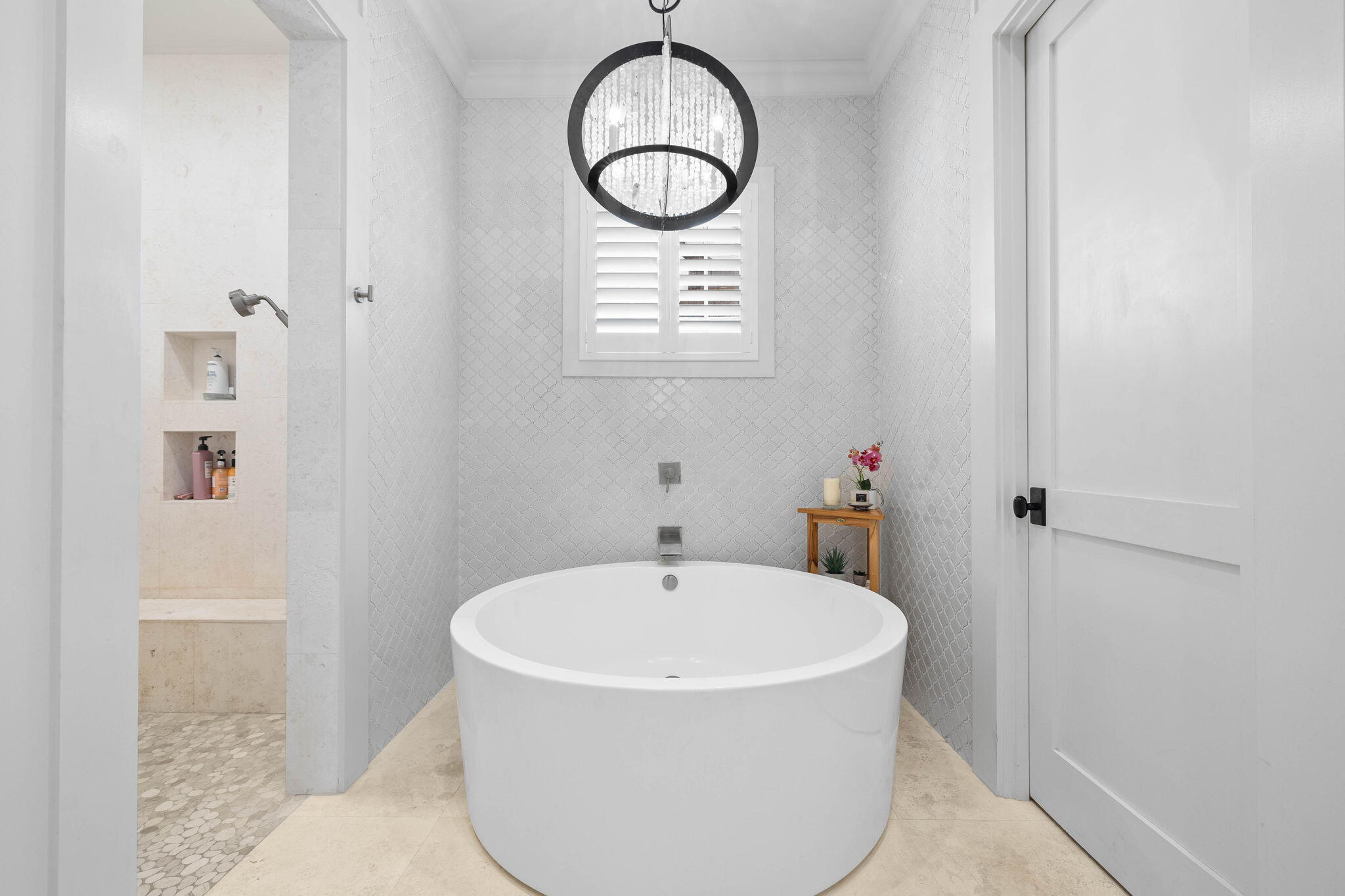 47 Compass Point Way Inlet Beach, FL 32461 - Photo 32 of 50 a bathroom with a white bath tub a sink and a window