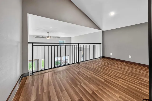 a bathroom with a sink toilet and a mirror