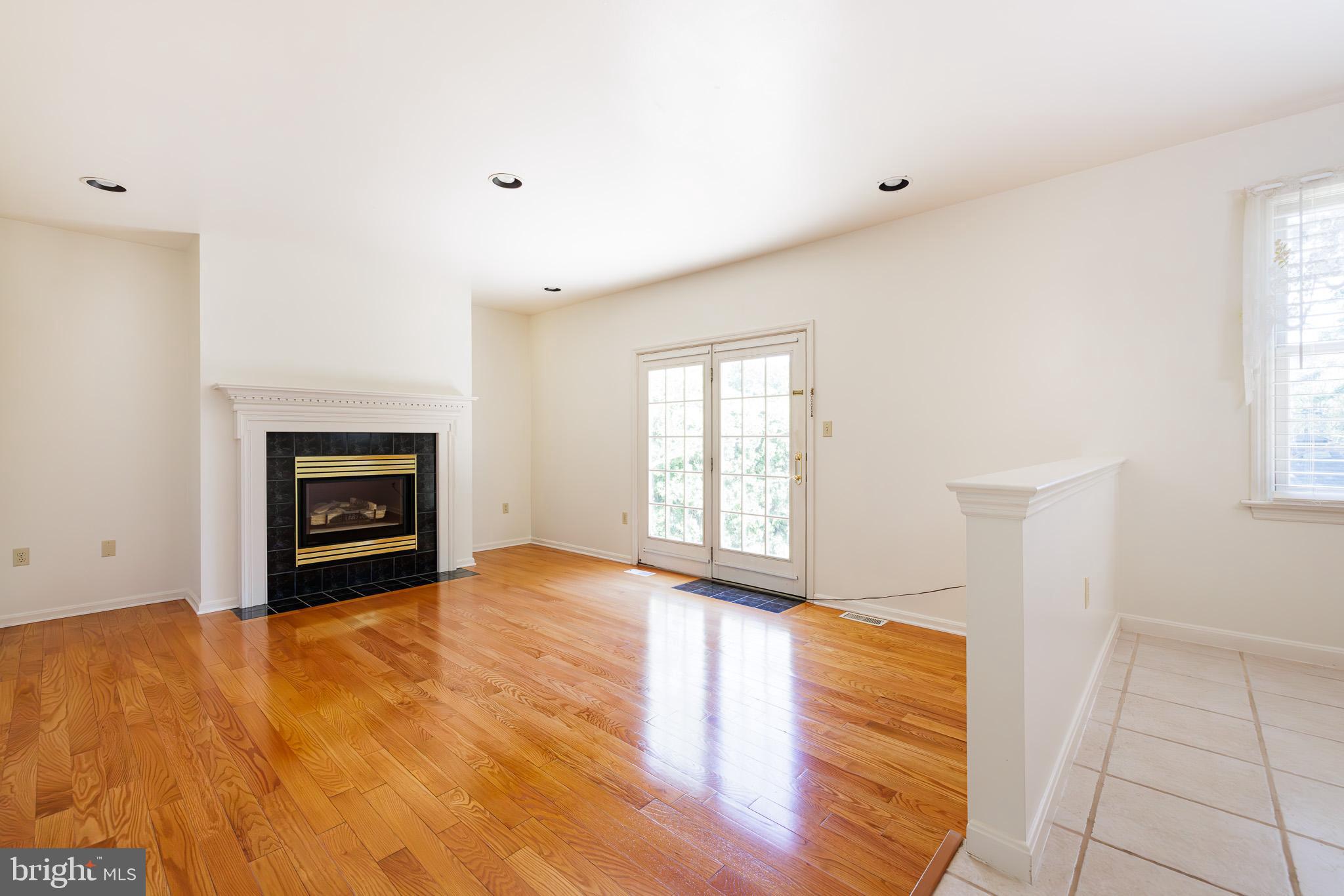 280 Raspberry Road Leola, PA 17540 - Photo 16 of 41 a view of an empty room with a fireplace and a window