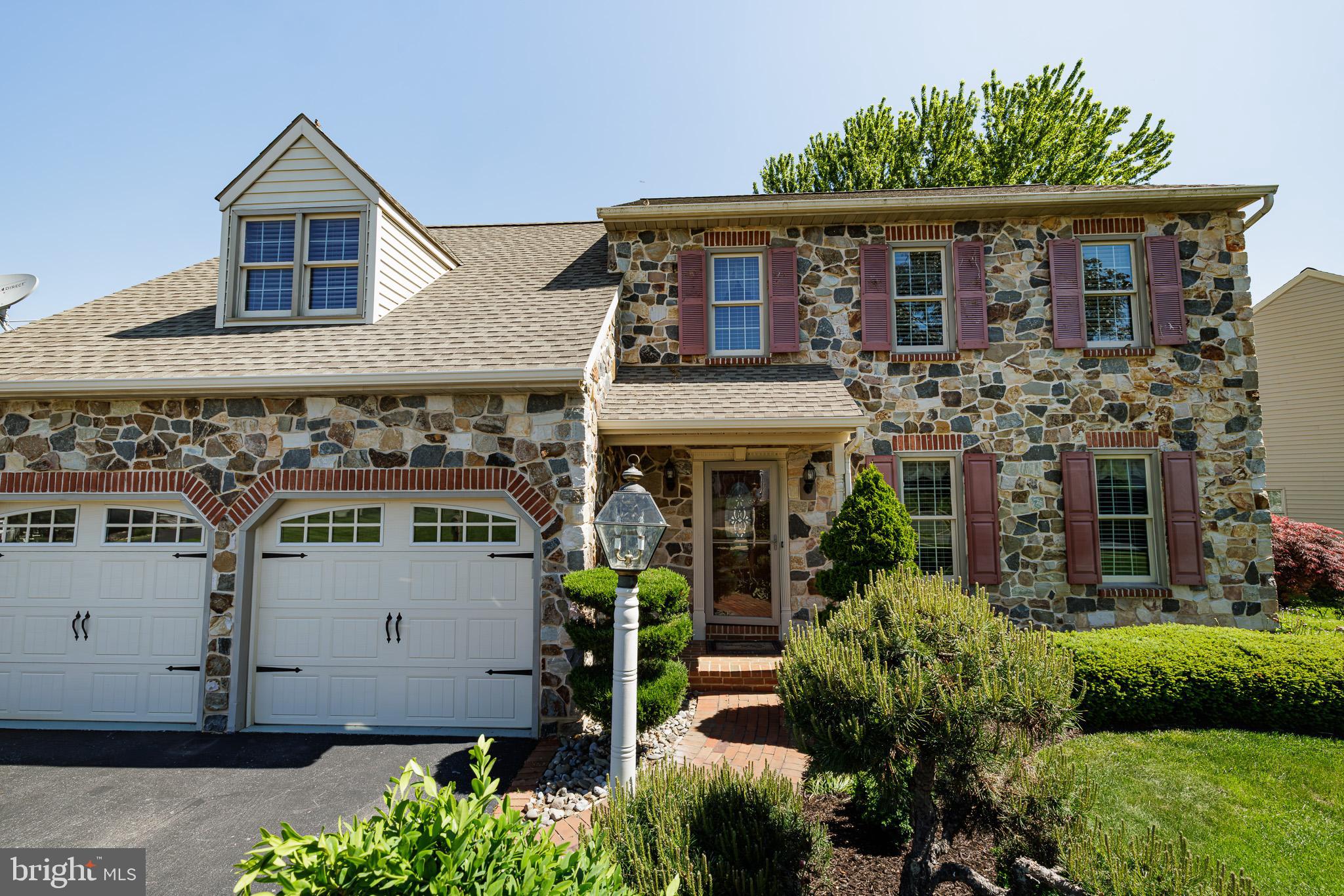 280 Raspberry Road Leola, PA 17540 - Photo 36 of 41 a front view of a house with garden
