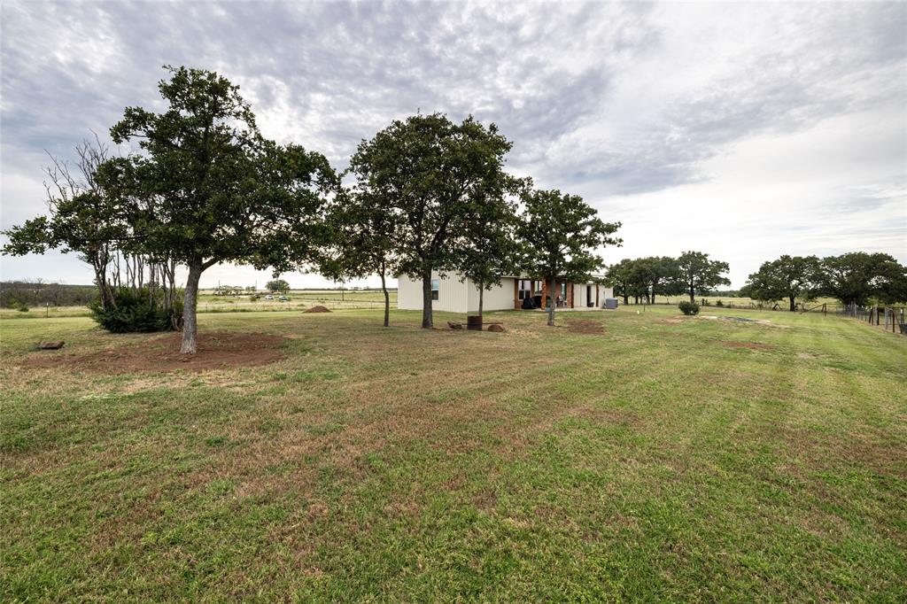493 Browning Road Bellevue, TX 76228 - Photo 16 of 33 a view of green field