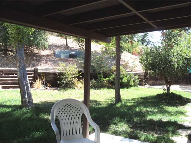 8859 Los Coches Road Lakeside, CA 92040 - Photo 13 of 25 The covered patio is on the east side of the house, shaded from the hot afternoon sun. On the upper bank is a barbecue pit for the 2nd smaller house.