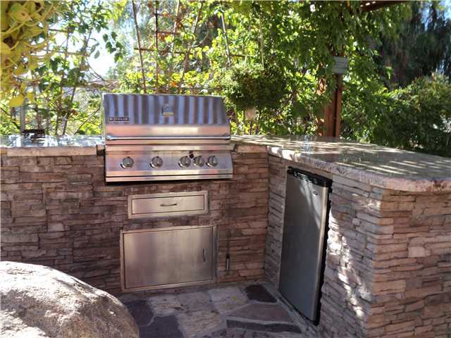 8859 Los Coches Road Lakeside, CA 92040 - Photo 24 of 25 In the back yard is a gorgeous built-in barbecue and countertops for poolside entertaining.