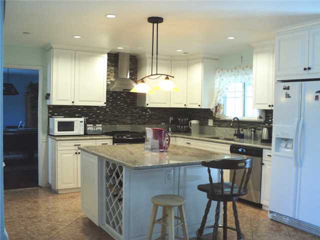 8859 Los Coches Road Lakeside, CA 92040 - Photo 8 of 25 Another view of the kitchen, remodeled in 2013, including the pretty tile floors.