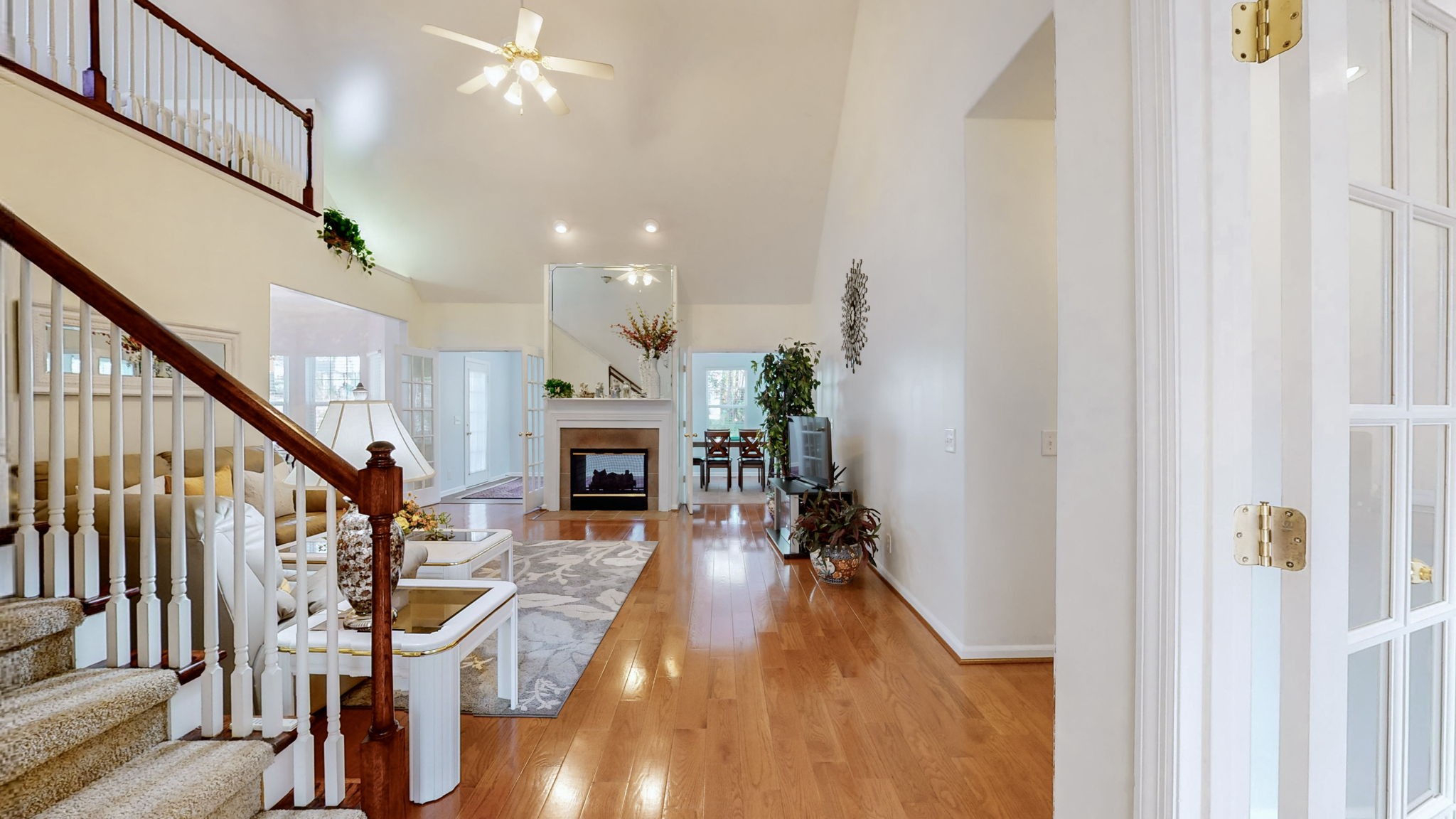 1608 Inverness Drive Spring Hill, TN 37174 - Photo 5 of 44 Large living room with vaulted ceilings make it feel even larger. Hardwood flooring make it a snap to clean