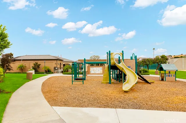 a view of a swimming pool with a lounge chairs