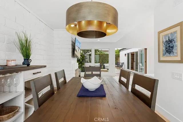 a kitchen with a white wooden cabinets and white appliances