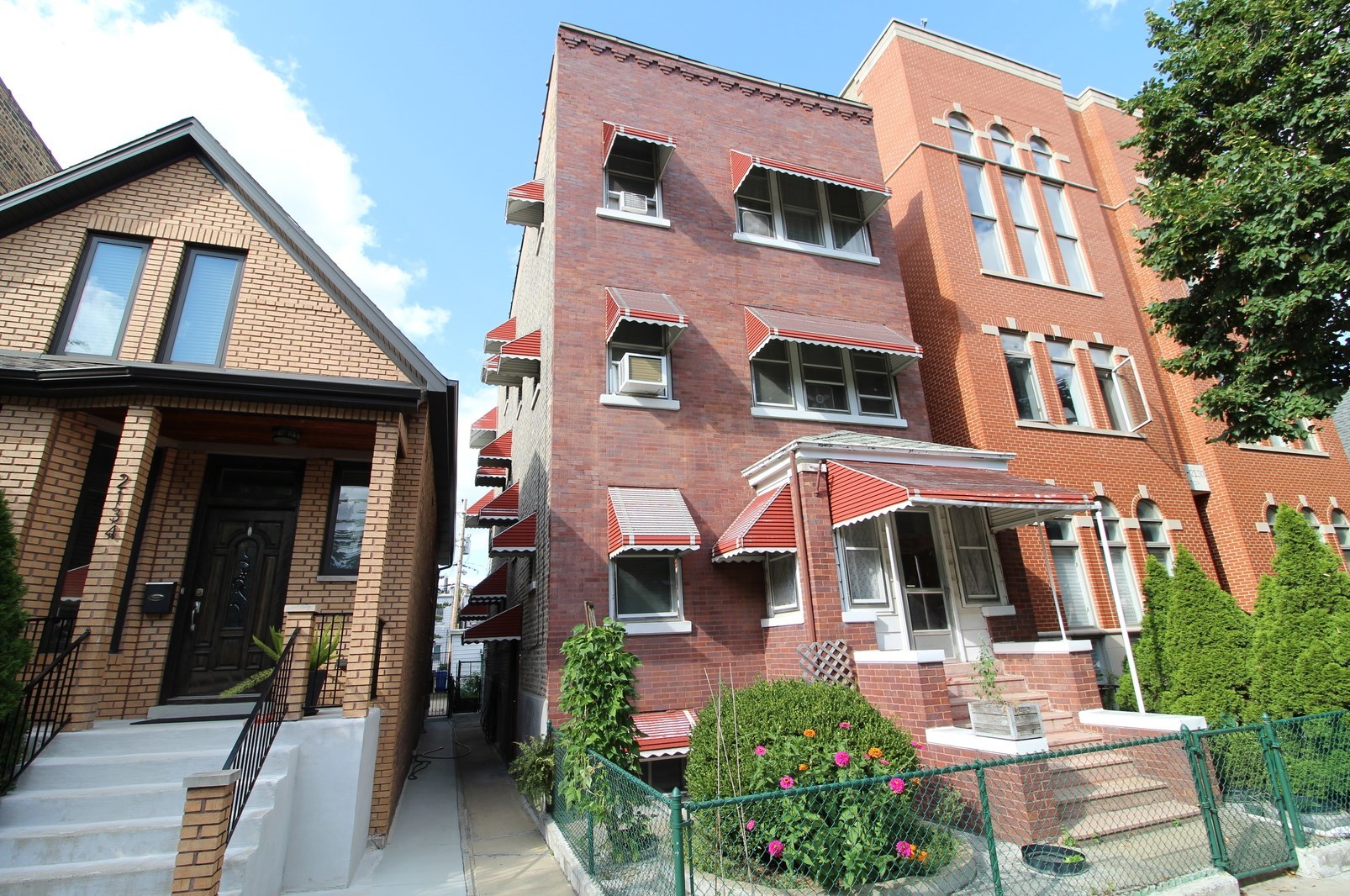 a front view of a multi story residential apartment building