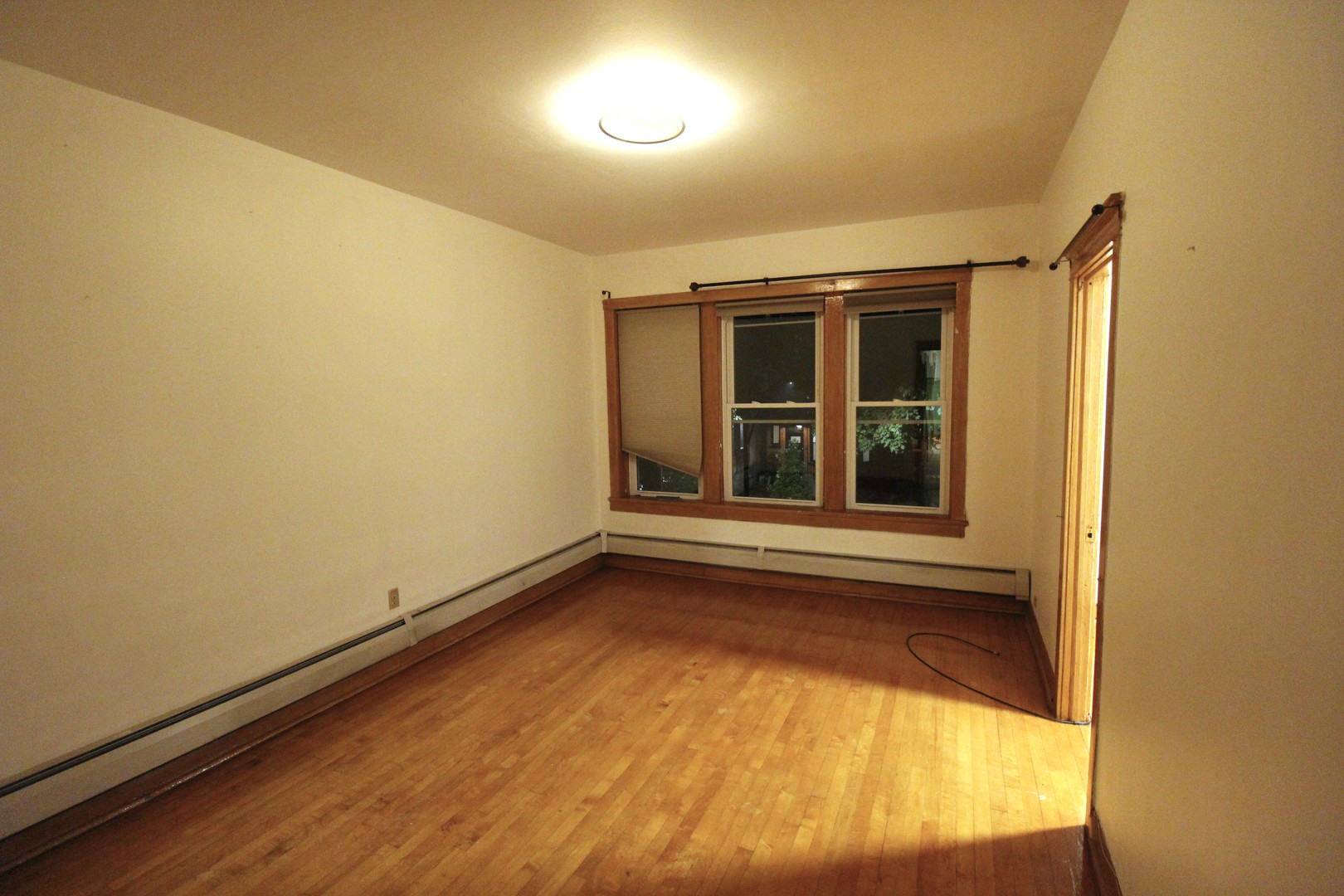 2132 West Walton Street, Unit 2 Chicago, IL 60622 - Photo 2 of 12 a view of an empty room with a window