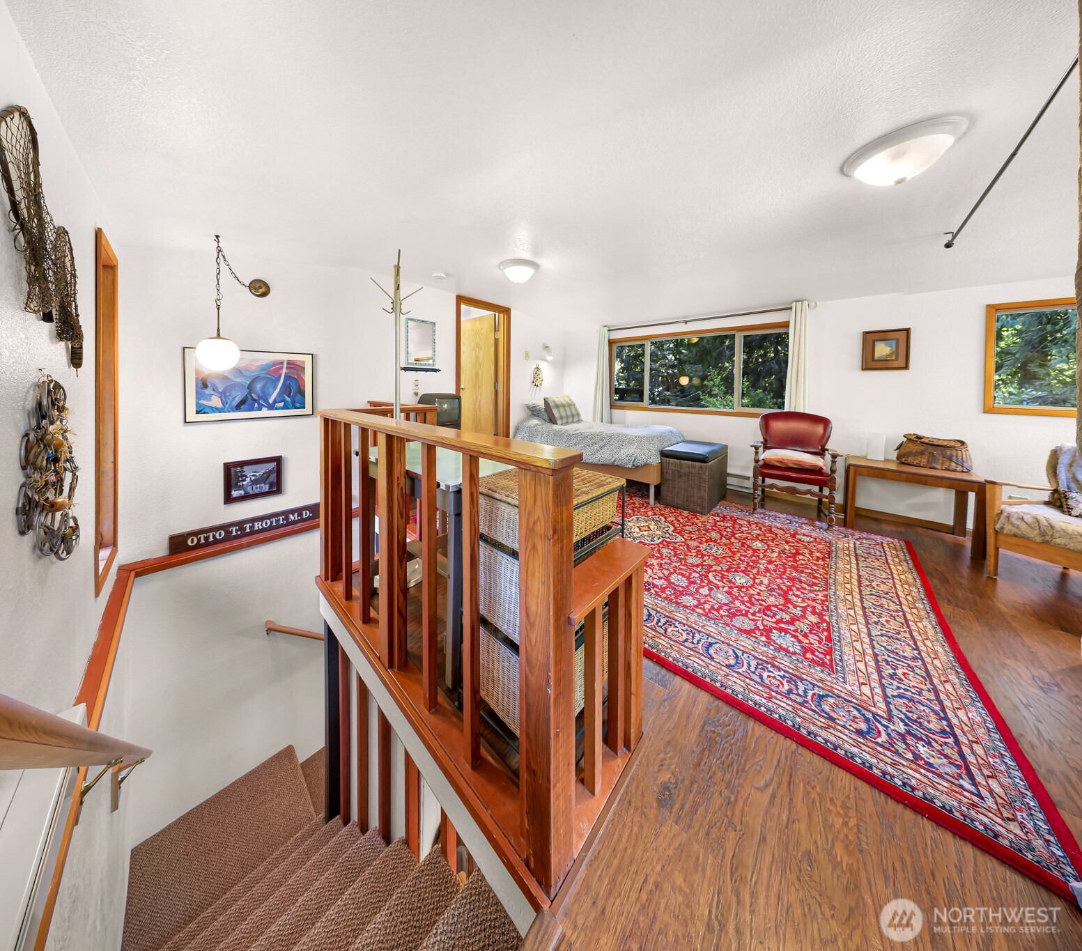 9778 Mt Baker Highway Deming, WA 98244 - Photo 14 of 40 a living room with lots of furniture and a wooden floor