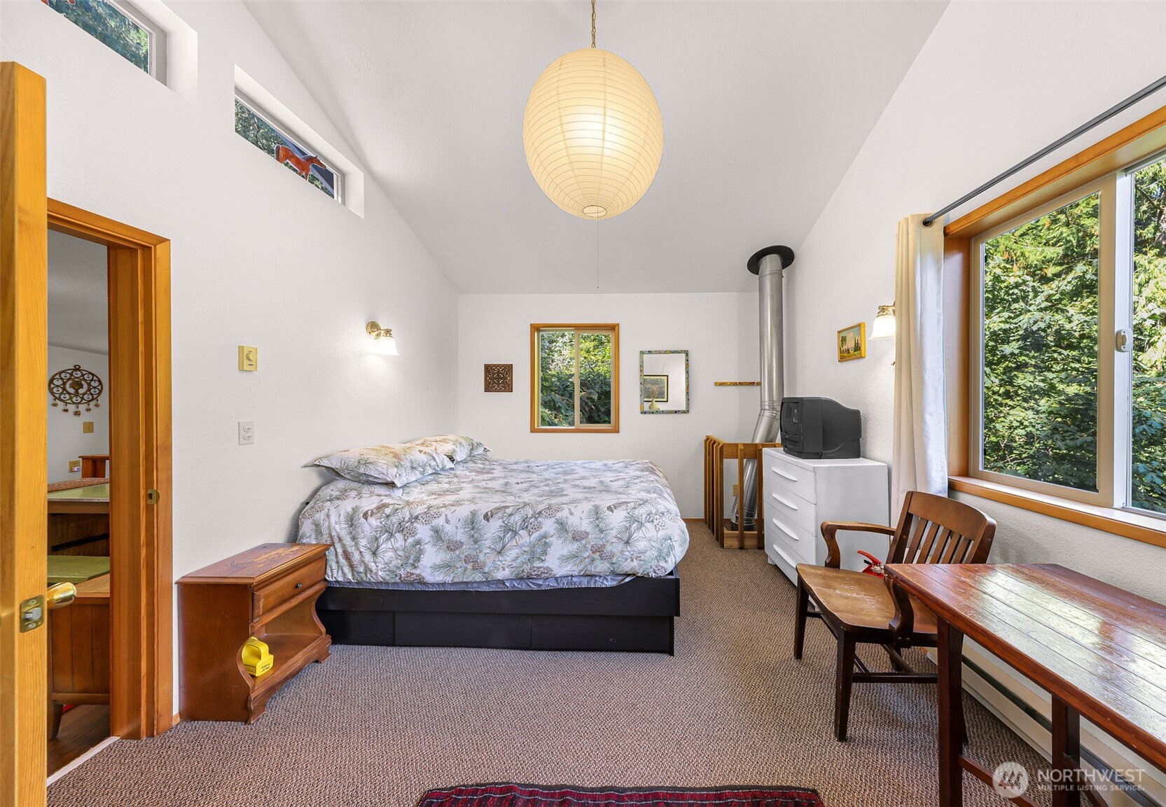 9778 Mt Baker Highway Deming, WA 98244 - Photo 24 of 40 a bedroom with furniture and a window