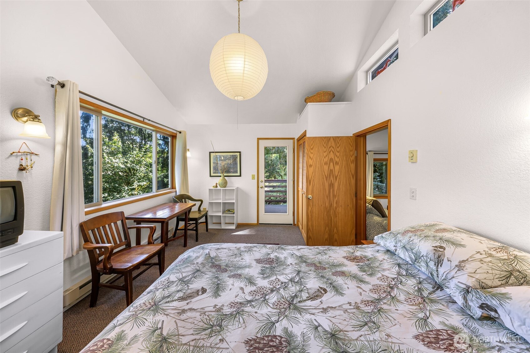 9778 Mt Baker Highway Deming, WA 98244 - Photo 25 of 40 a bedroom with a bed and wooden floor