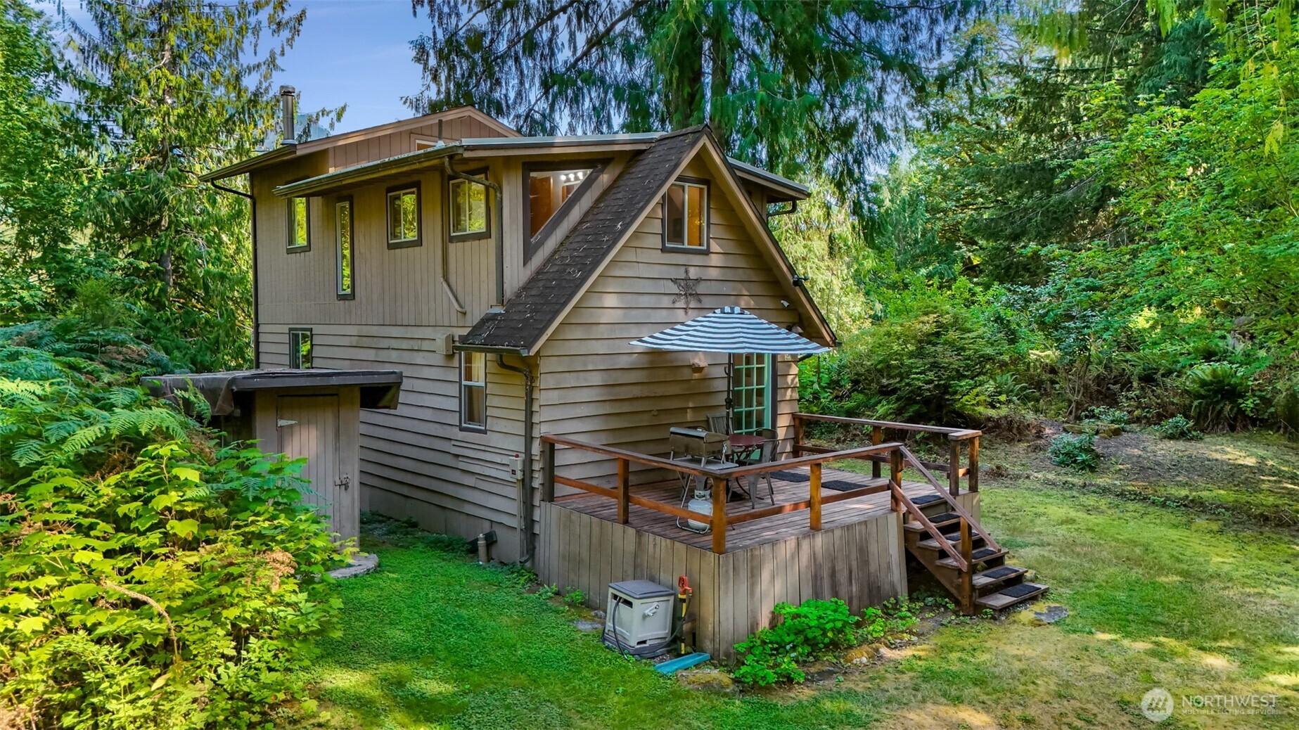 9778 Mt Baker Highway Deming, WA 98244 - Photo 30 of 40 a front view of a house with a yard
