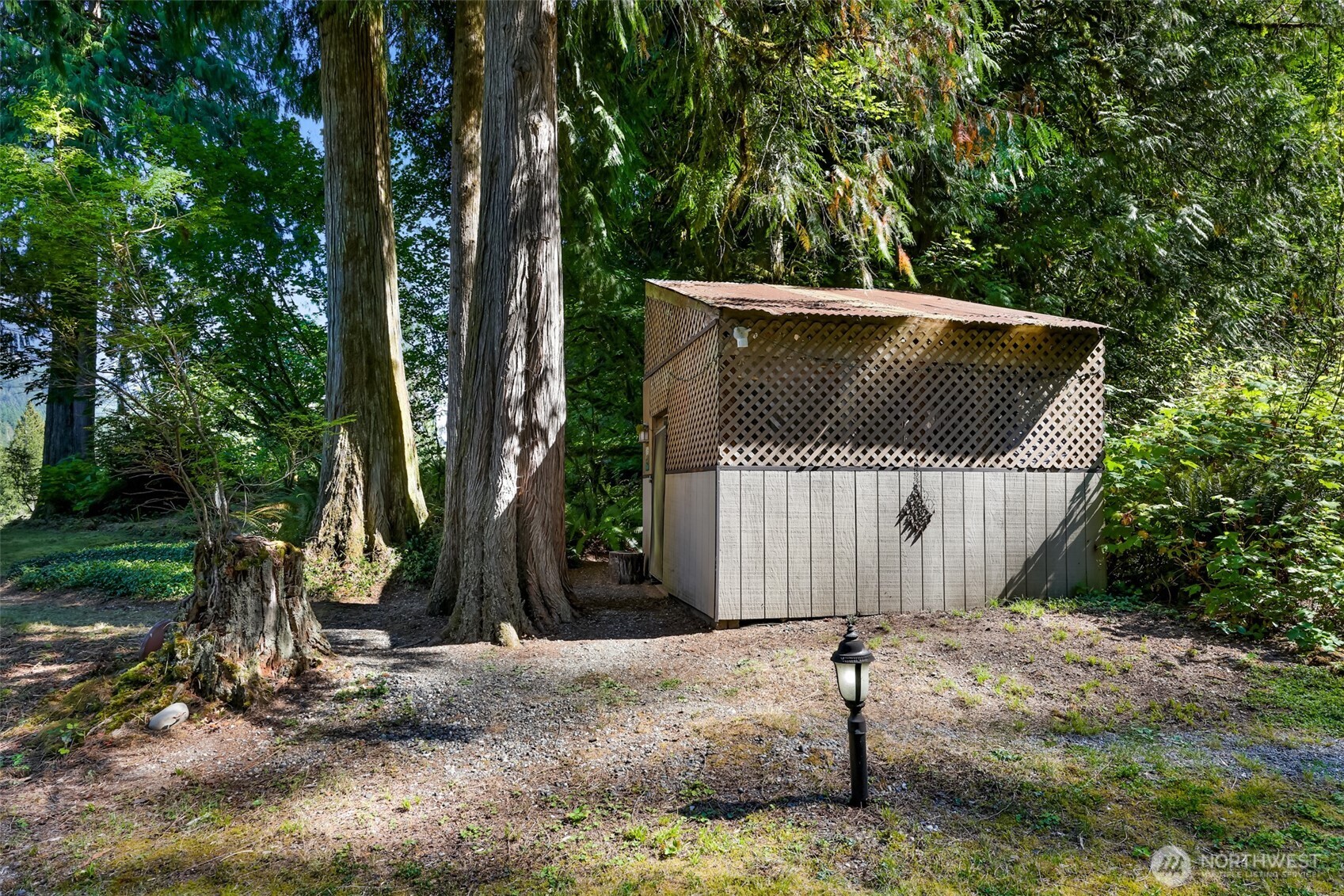 9778 Mt Baker Highway Deming, WA 98244 - Photo 31 of 40 a front view of a house with a yard