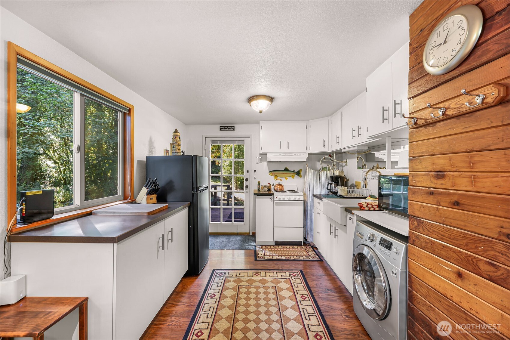 9778 Mt Baker Highway Deming, WA 98244 - Photo 10 of 40 a kitchen that has a sink and a stove