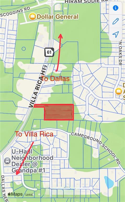 a room with a small pool table and chairs