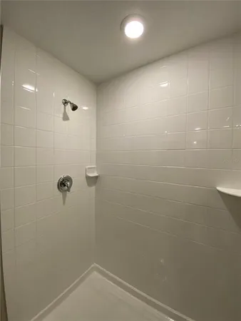 a view of a room with racks on the wall