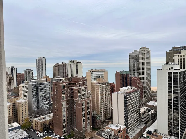 a view of city with tall buildings