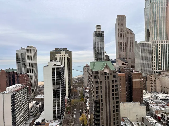 a view of city with tall buildings