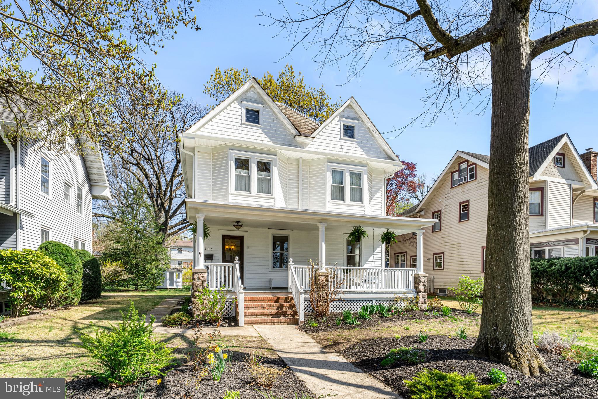 403 Midway Riverton, NJ 08077 - Photo 1 of 53 a front view of a house with a yard