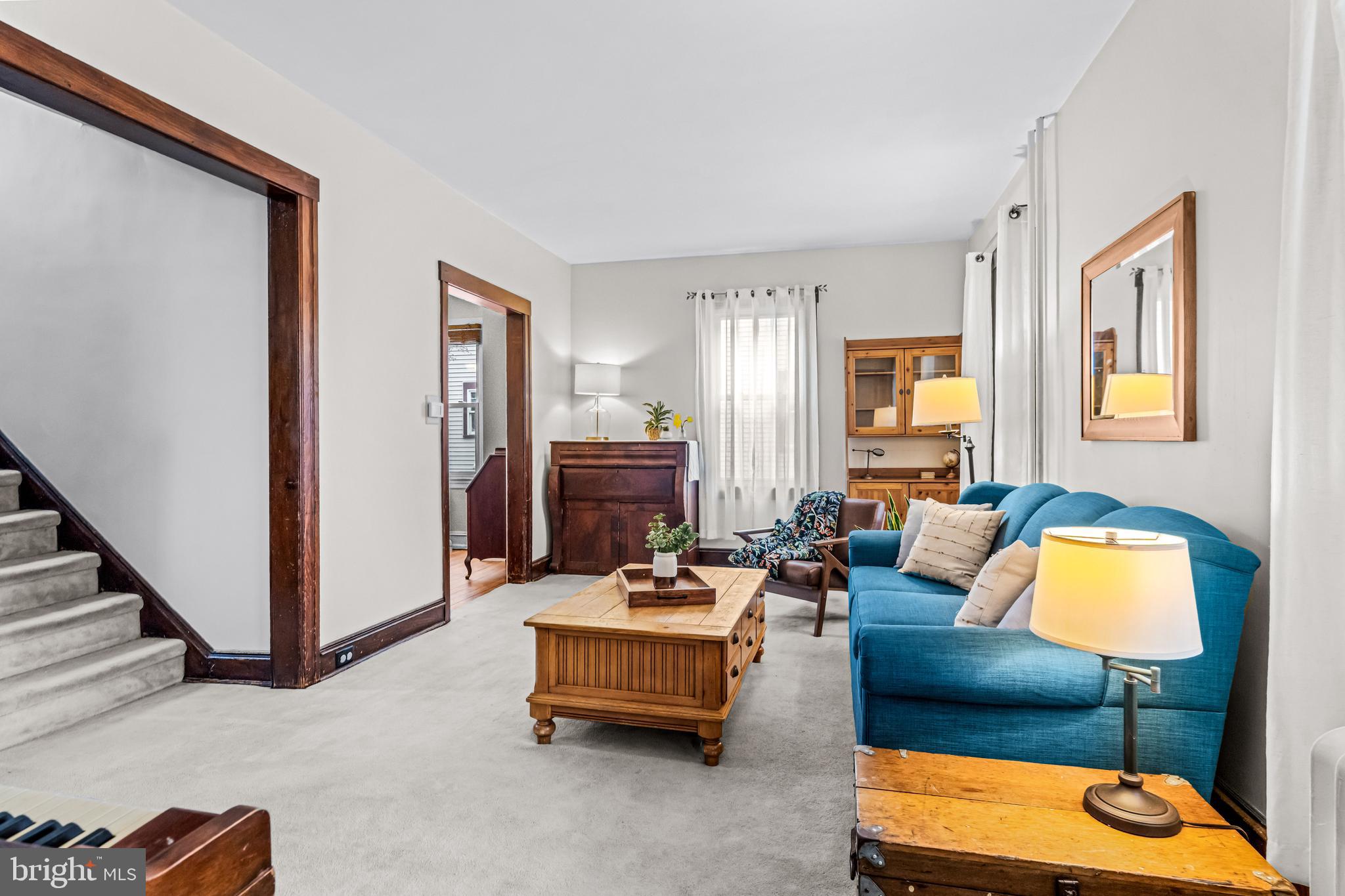 403 Midway Riverton, NJ 08077 - Photo 12 of 53 a living room with furniture and a flat screen tv