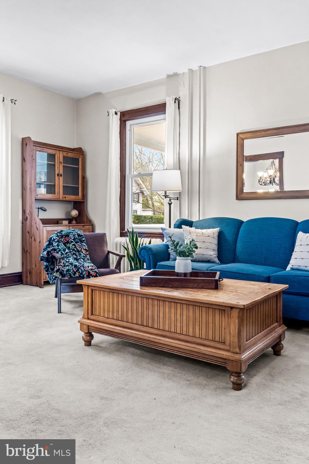 403 Midway Riverton, NJ 08077 - Photo 17 of 53 a living room with furniture and a large window