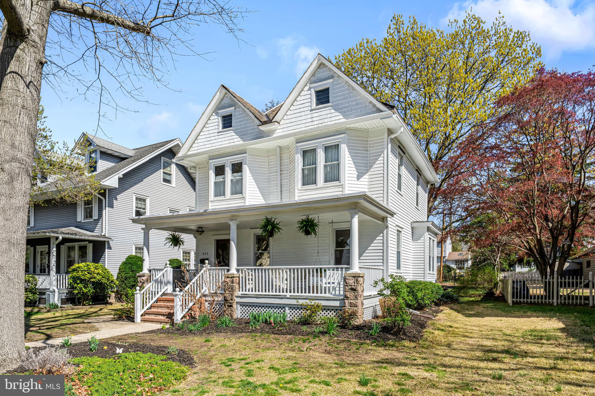 403 Midway Riverton, NJ 08077 - Photo 2 of 53 a front view of a house with garden