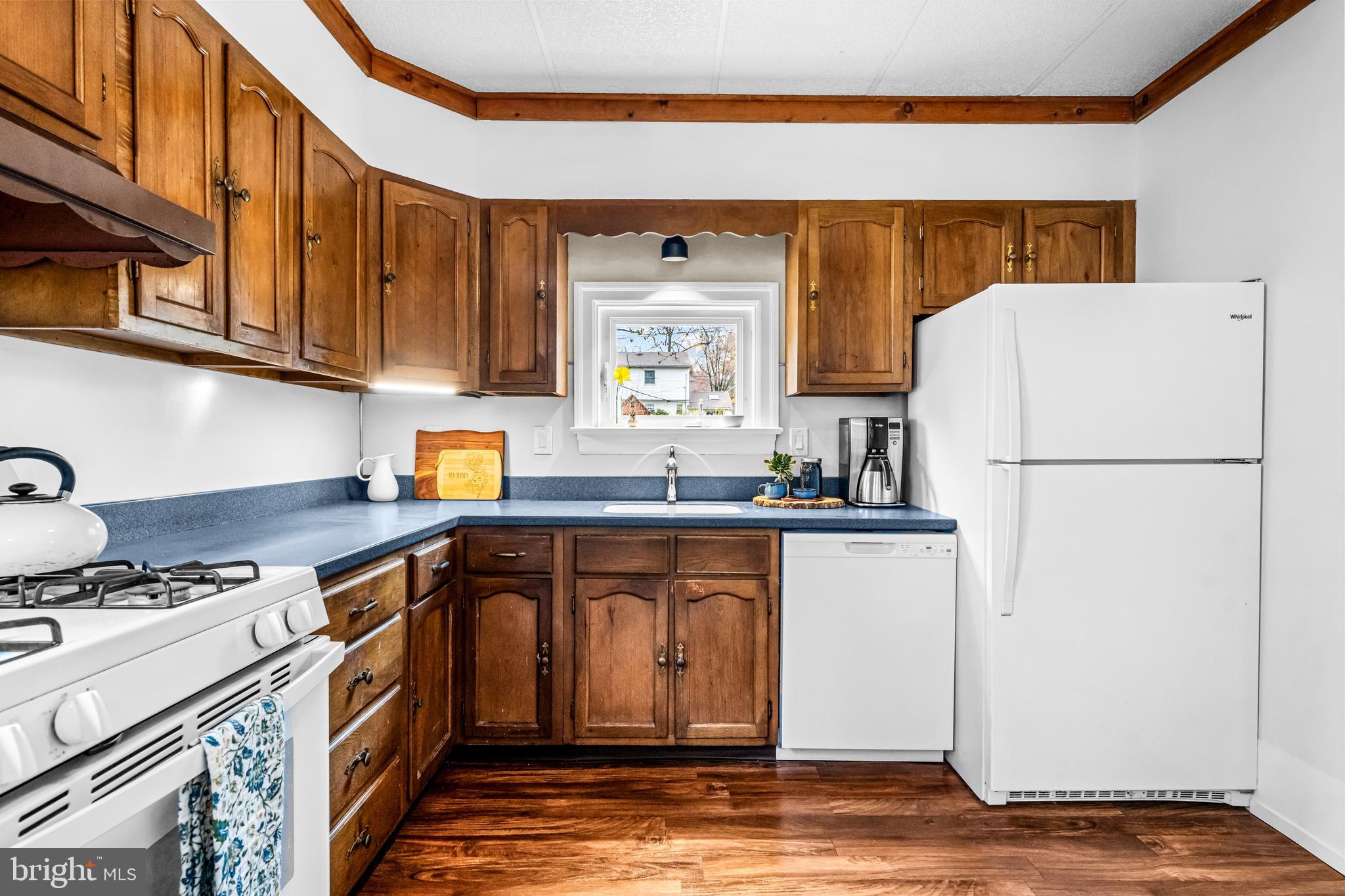 403 Midway Riverton, NJ 08077 - Photo 25 of 53 a kitchen with stainless steel appliances granite countertop a refrigerator and a stove