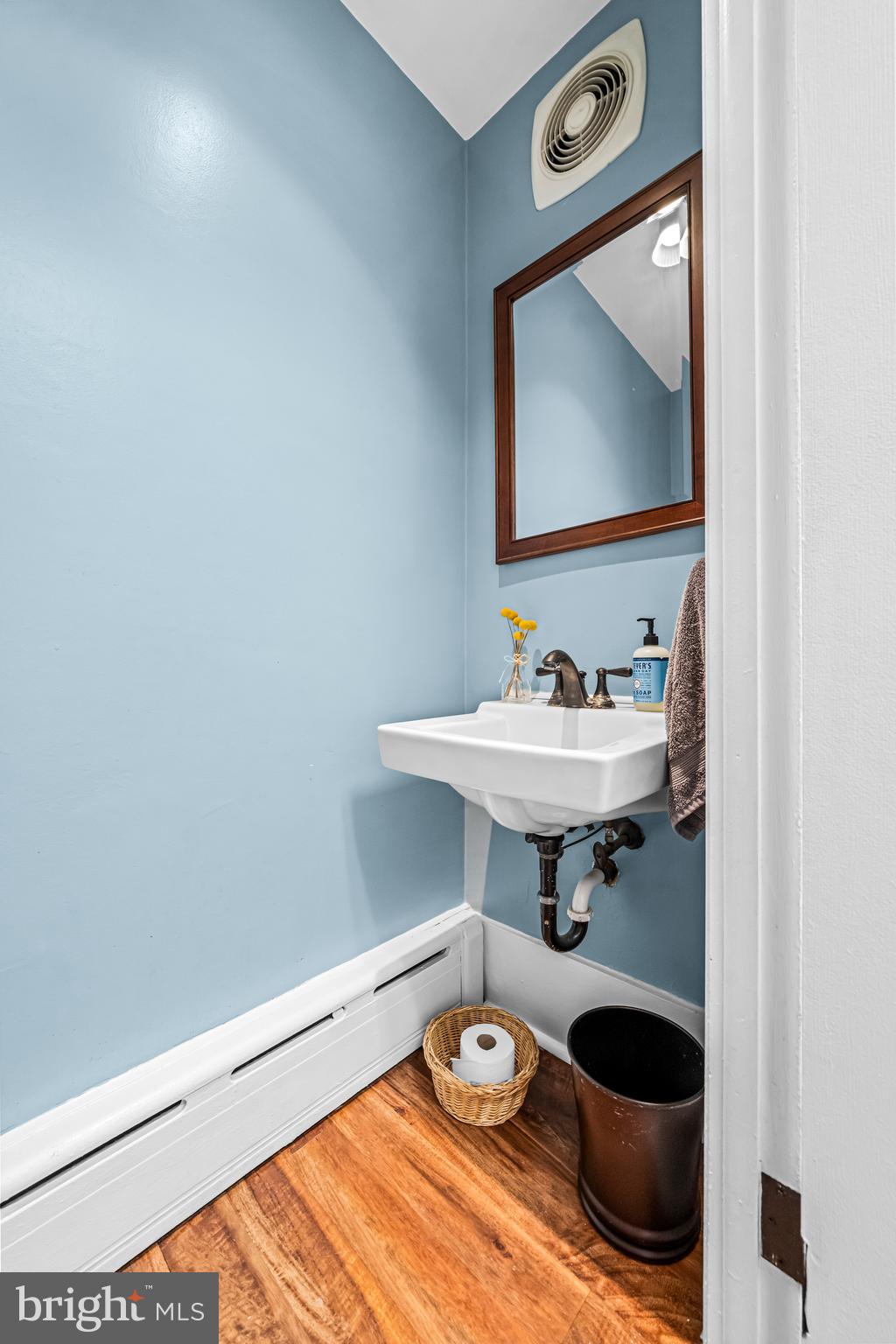 403 Midway Riverton, NJ 08077 - Photo 28 of 53 a bathroom with a sink and a mirror