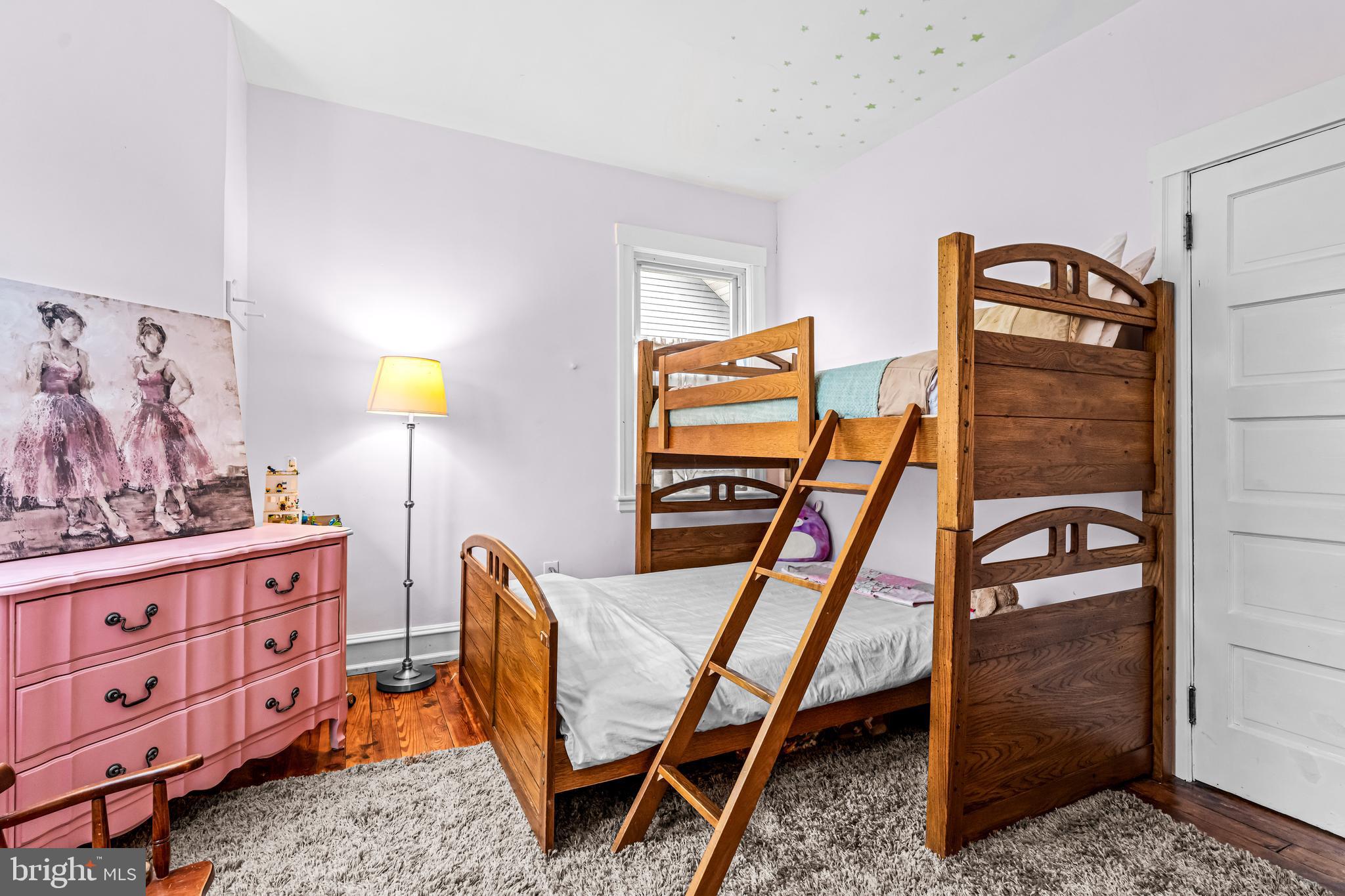 403 Midway Riverton, NJ 08077 - Photo 37 of 53 a room with furniture and a wooden floor