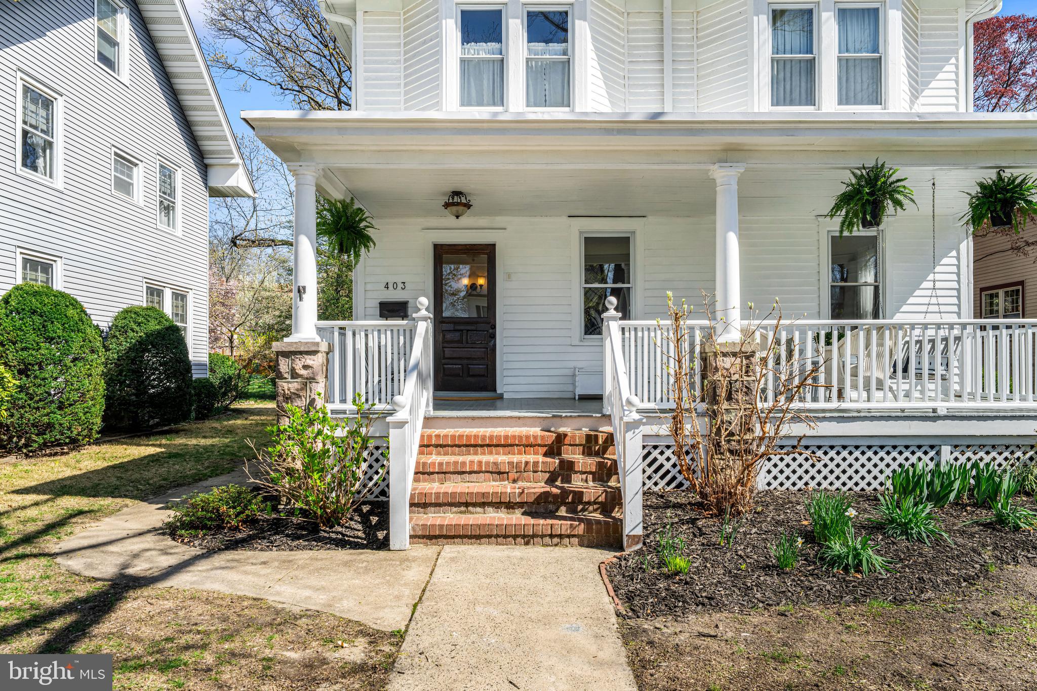 403 Midway Riverton, NJ 08077 - Photo 6 of 53 a front view of a house with a porch