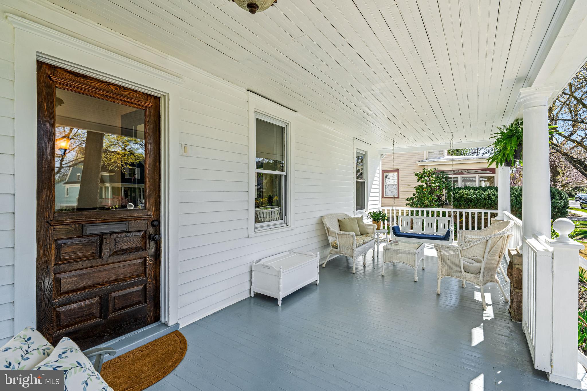 403 Midway Riverton, NJ 08077 - Photo 7 of 53 a balcony with furniture and a potted plant