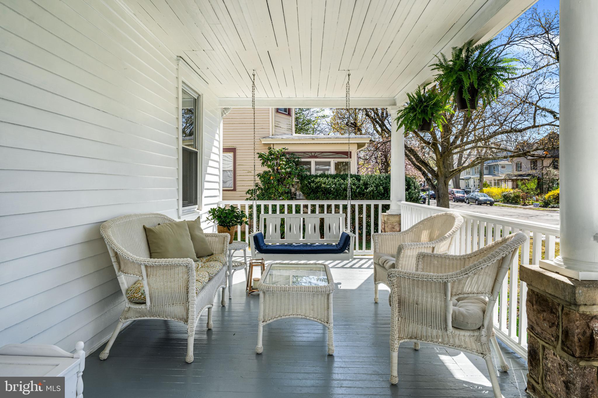 403 Midway Riverton, NJ 08077 - Photo 8 of 53 a view of a chair and tables in the balcony