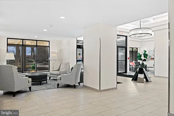 a view of a livingroom with furniture and windows