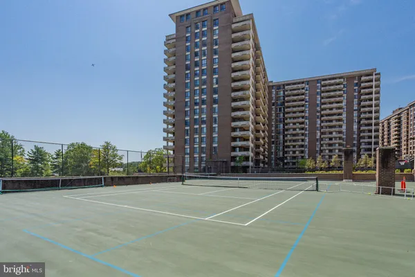 a building with trees in front of it