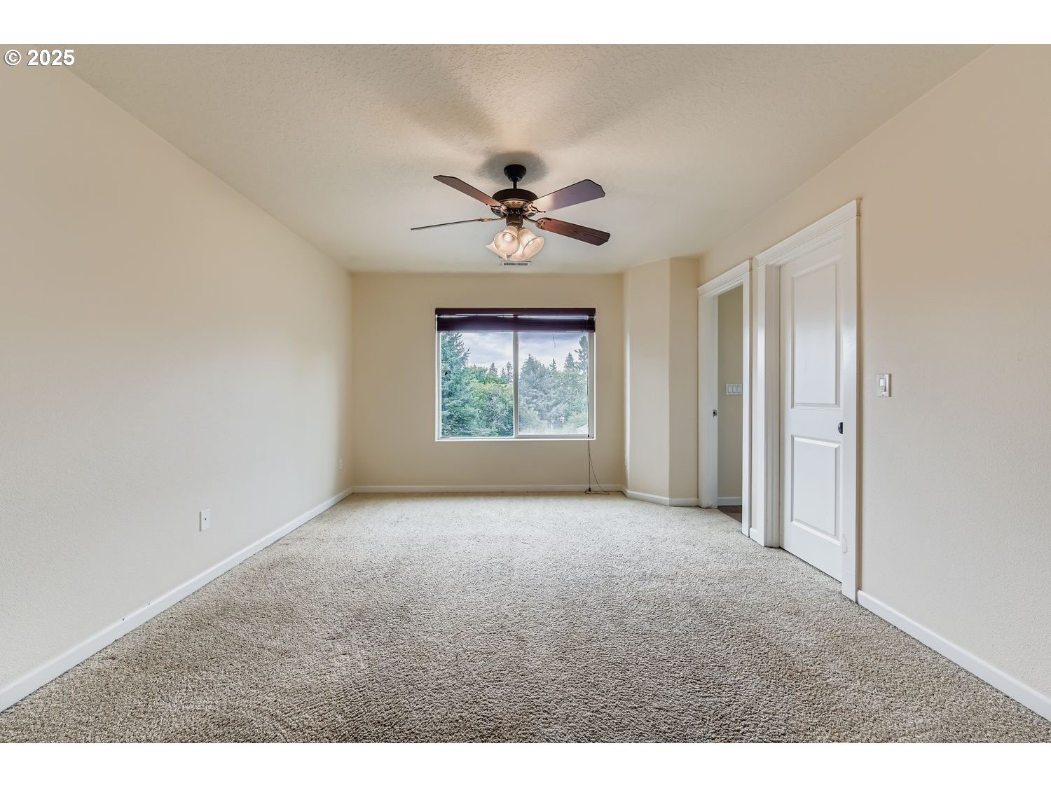 7912 Northeast Klickitat Street Portland, OR 97213 - Photo 13 of 29 a view of n empty room with a window