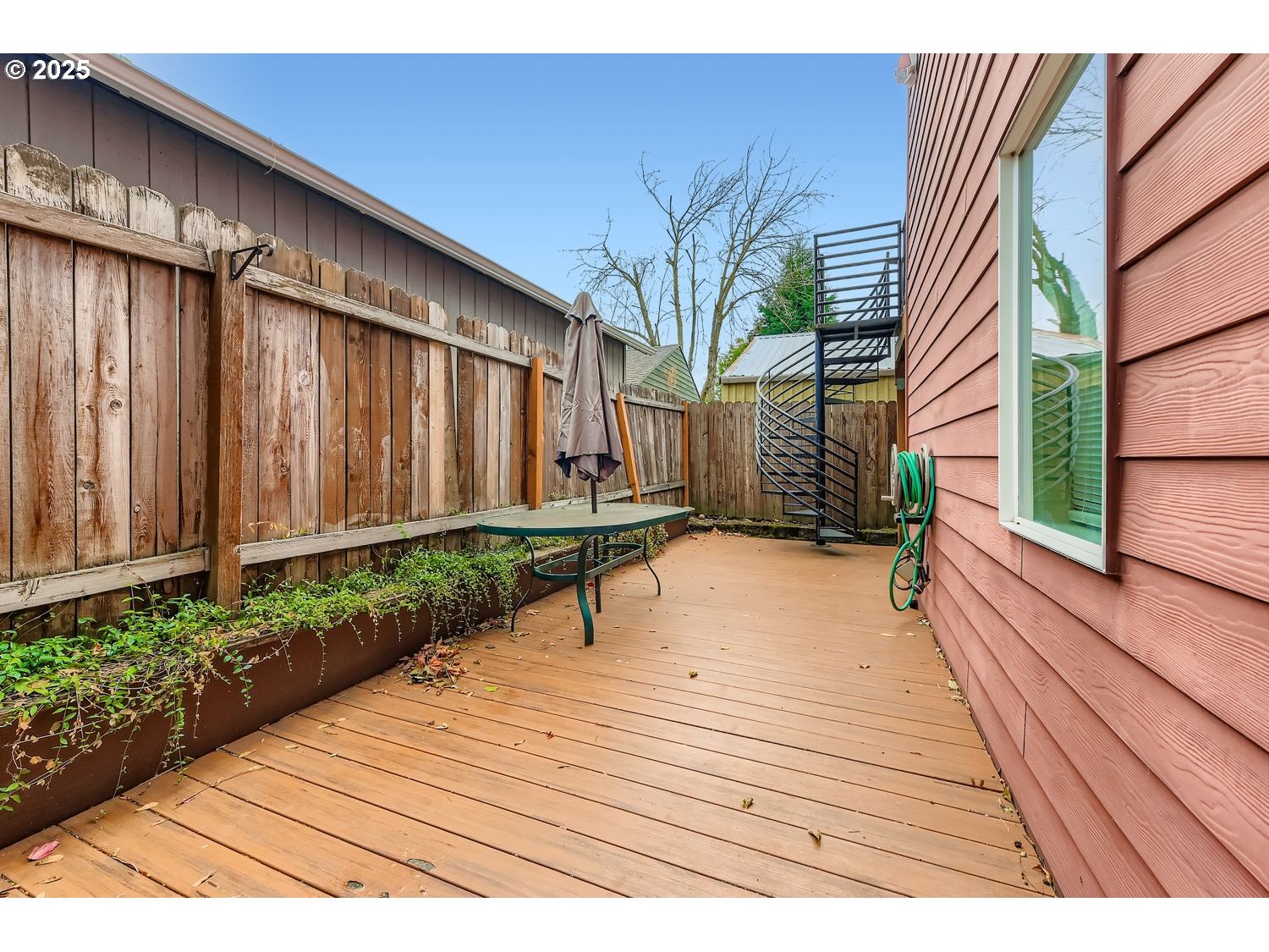 7912 Northeast Klickitat Street Portland, OR 97213 - Photo 24 of 29 a view of a backyard with potted plants