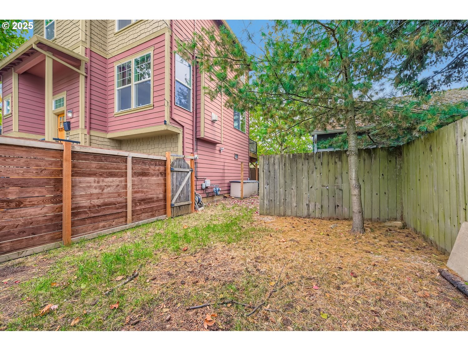 7912 Northeast Klickitat Street Portland, OR 97213 - Photo 25 of 29 a backyard of a house with lots of green space