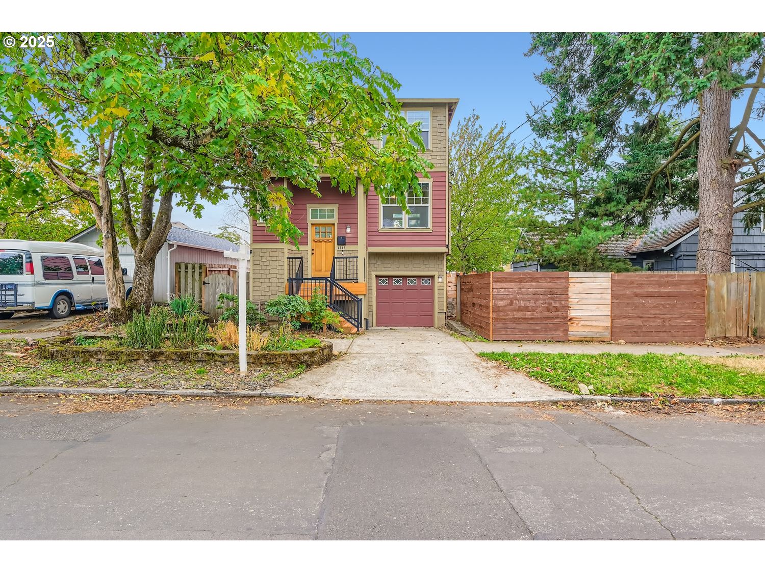 7912 Northeast Klickitat Street Portland, OR 97213 - Photo 3 of 29 a view of a house with a yard and large tree
